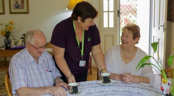Home care assistant helping residents in their home