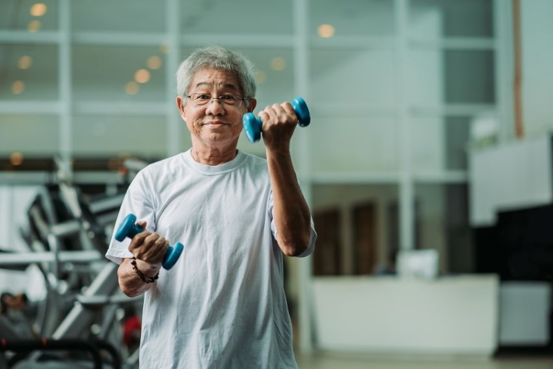 Senior Queensland man exercising at a WMQ wellbeing centre
