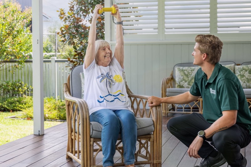 In-home exercise physiology session with an elderly client and wmq allied health professional