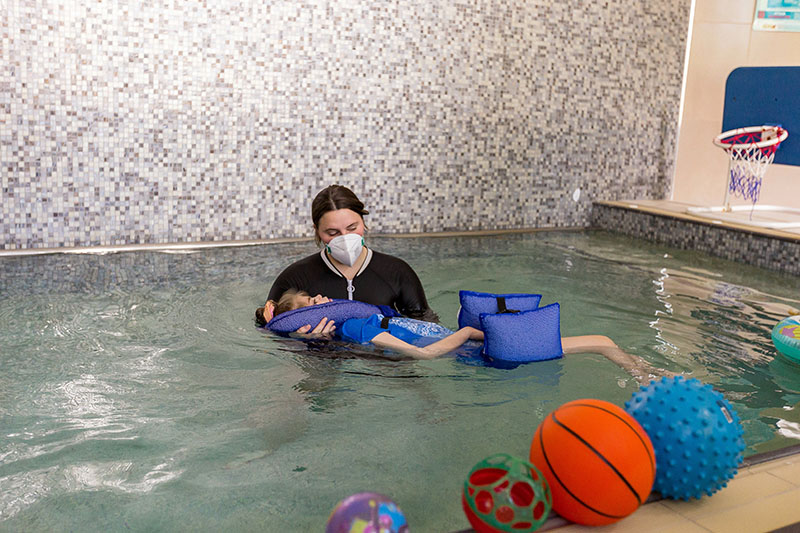 Child with a disability during hydrotherapy session at our facility in Chermside, Brisbane North