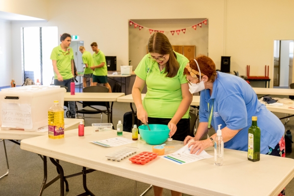 Young woman with disability making bath bombs at The Orca project