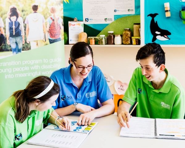 Supportive environment at ORCA Two school leavers working with an ORCA staff member