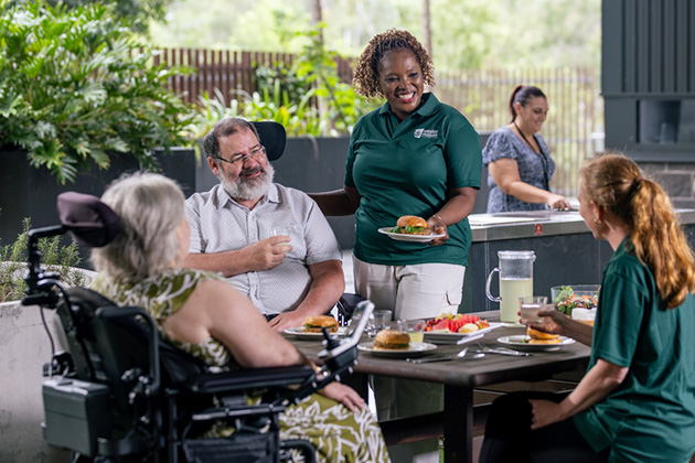 disabiity-accommodation-brisbane-01 Staff and residents in a disability accommodation in Brisbane