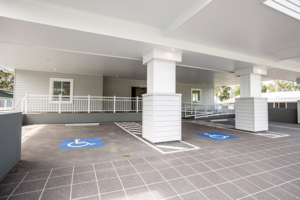 Disabled parking with ramp at our Hamptons style Specialist Disability Accommodation in Hope Island, Gold Coast