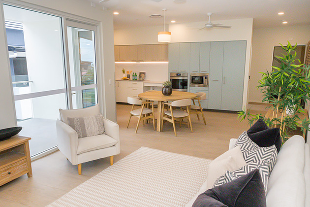 Integrated living and kitchen at NDIS specialist disability accommodation in Murrarie, South Brisbane