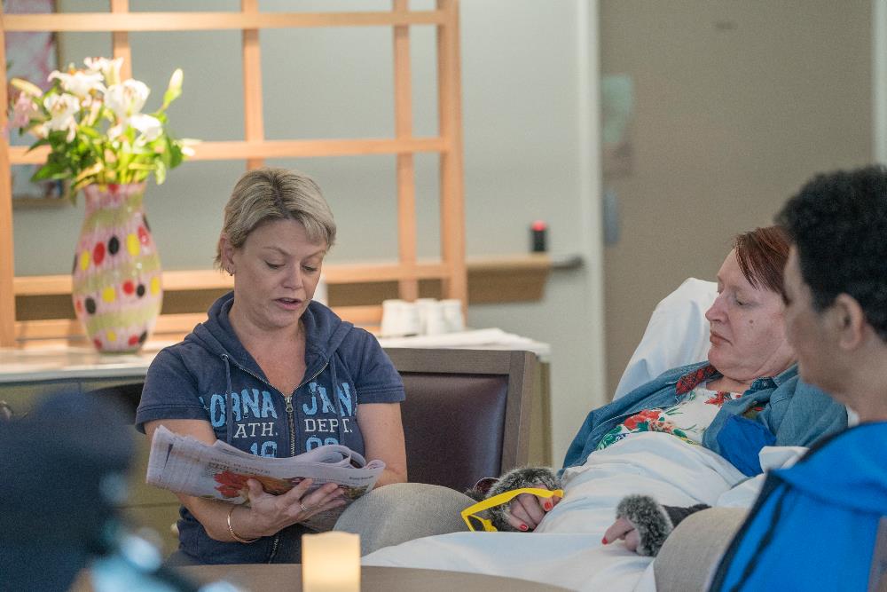 Group of women chat in our respite specialist disability accommodation in Sinnamon Park