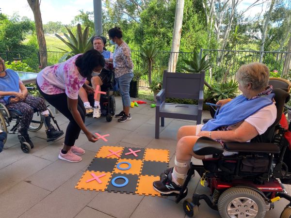 WesleyCare Sinnamon residents playing games outdoors
