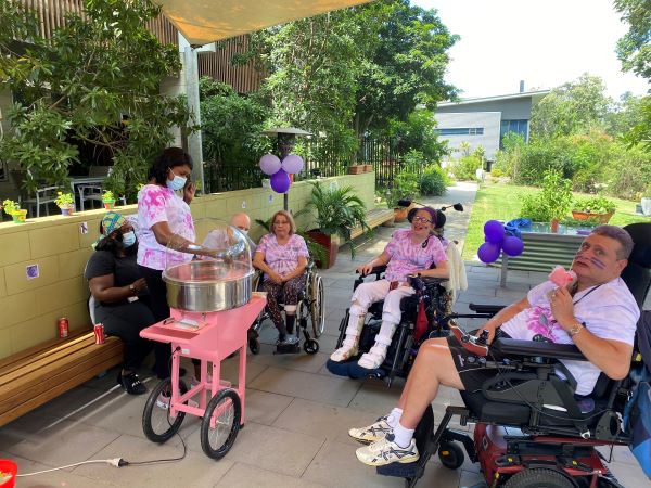 WesleyCare Sinnamon residents having outdoor celebration with fairy floss