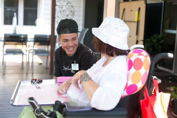 WesleyCare Tewantin resident chatting to support worker