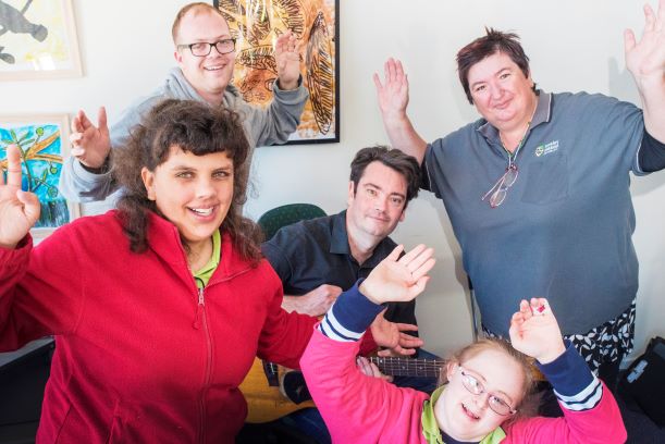 Group of people during an art activity for people with disability, in Brisbane