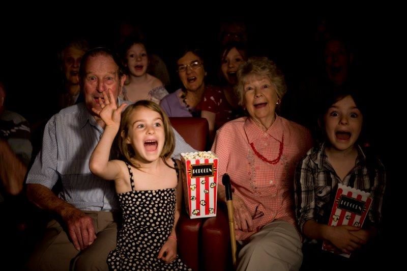 people-sitting-down-in-a-cinema-to-watch-movie