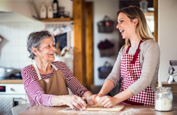 In home assistant helping a resident with baking