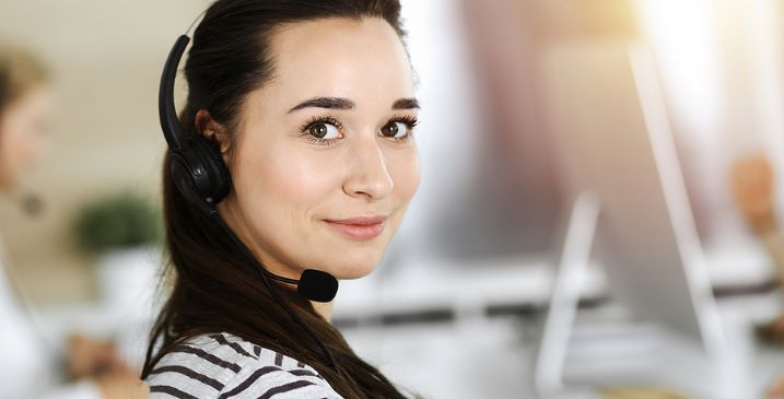 Lady answering customer enquiries via the phone