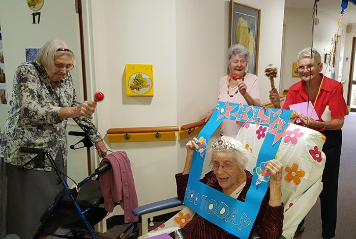 women in aged care home celebrating a birthday