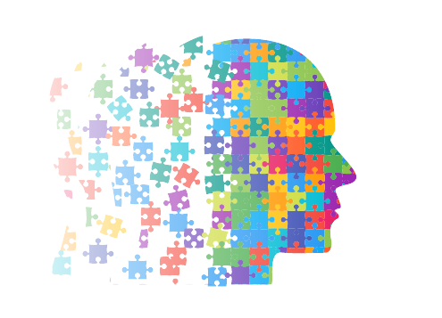 coloured puzzle pieces making up a profile of a face