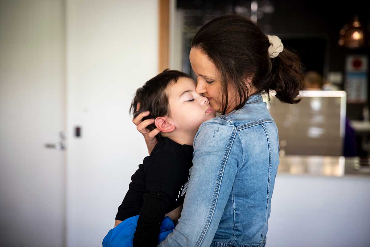 Mother holding her child