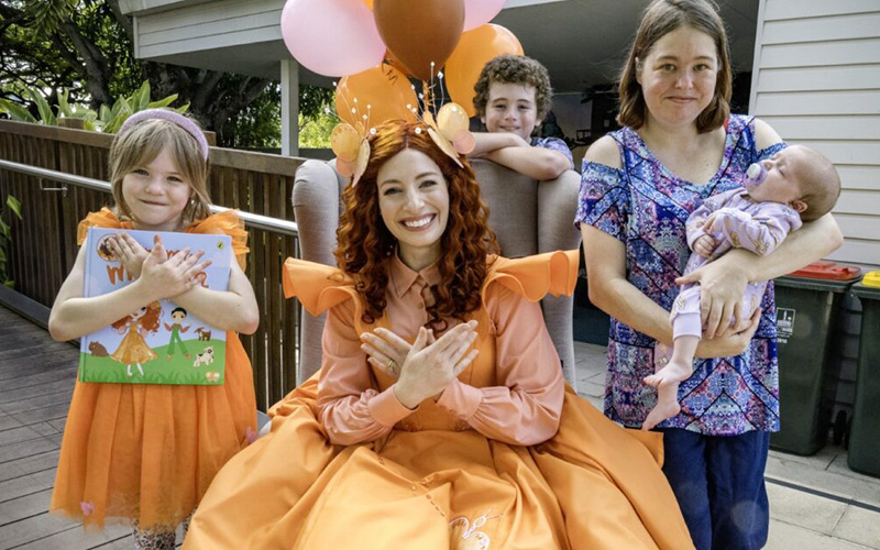 Emma with a family at children's hospice Hummingbird House