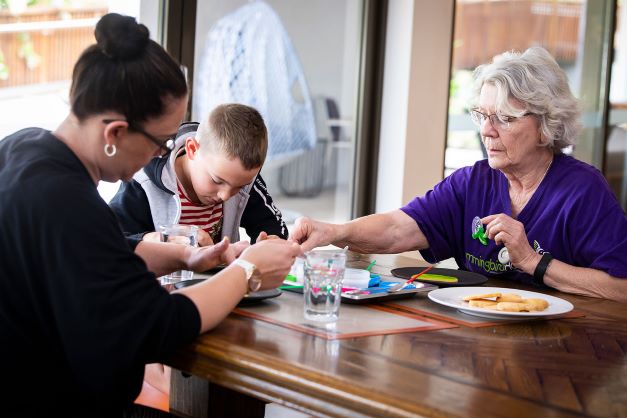 Fun activities like cookie decorating at Hummingbird House