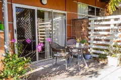 Outdoor seats and table in a patio area