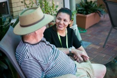 Residential aged care resident with staff member