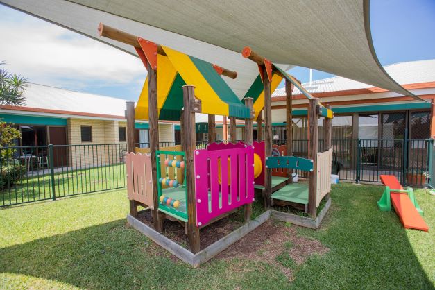 Shaded children's playground at Cooper House