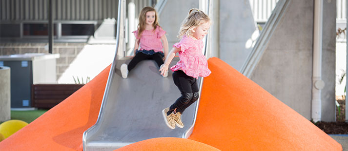 Kids playing in the playground at Dovetree