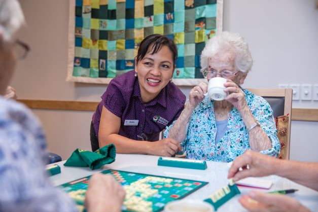 Dovetree scrabble game Resident enjoying game of scrabble in one of our residential aged care communities in Brisbane