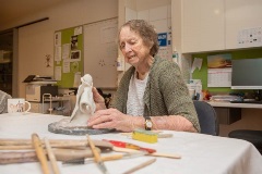 Lady enjoying an art class