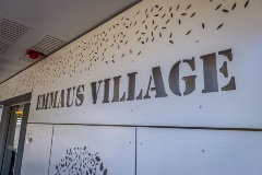 Entrance sign to Emmaus Village