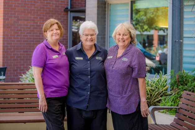 Three team members at John Wesley Gardens