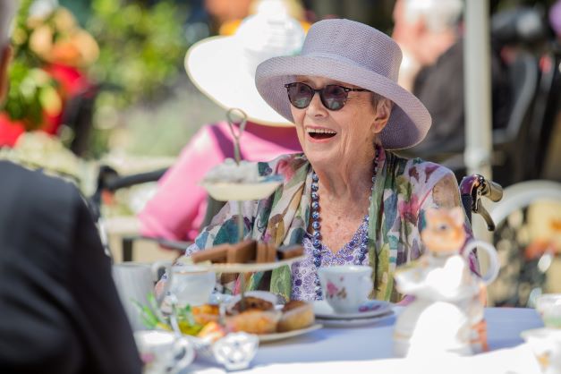 John Wesley Garden's resident enjoying a high tea