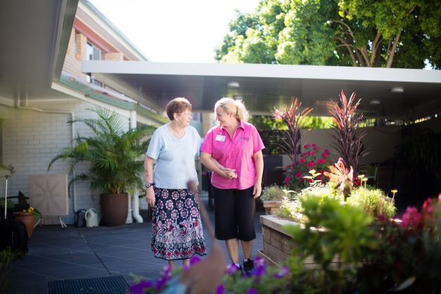 Staff and resident walking, Kentish Court