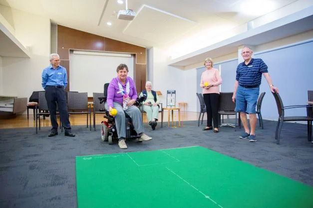 Indoor bowls at Parkview Retirees play indoor bowls in our residential aged care community in Brisbane