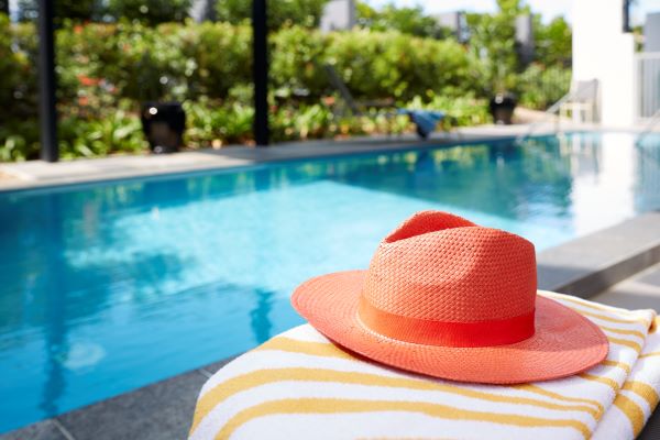 Pool at Aldersgate A colourful hat by pool at Aldersgate retirement village, in Red Hill, Brisbane