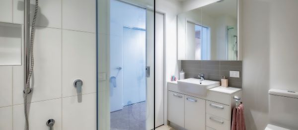 Bathroom with shower, sink and toilet