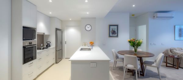 Kitchen and dining table in a Rosemount apartment