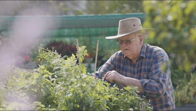 Resident doing gardening at Wheller on the Park