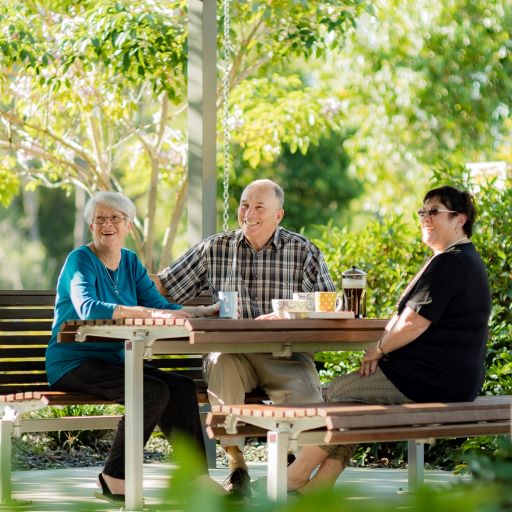 Friends having a coffee outside