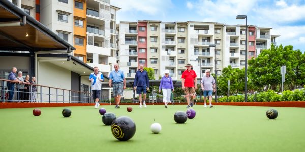 Residents playing lawn bowls at Wheller on the Park