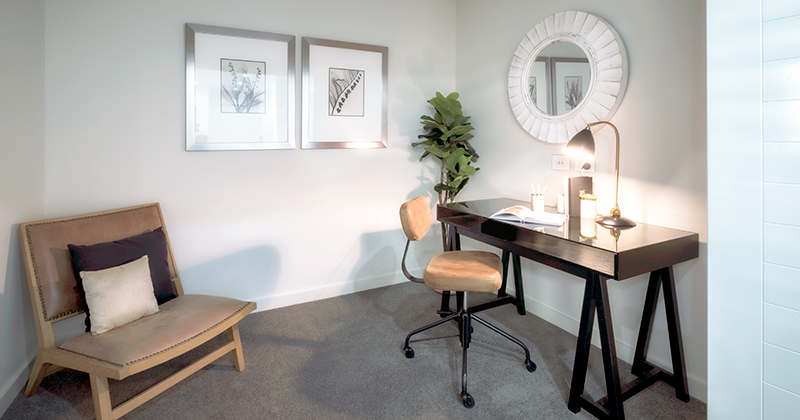 Study area with desk, chair and lamp