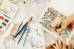 Artist drawing a floral picture
