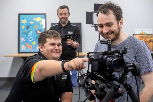 Students attending a digital film and TV workshop