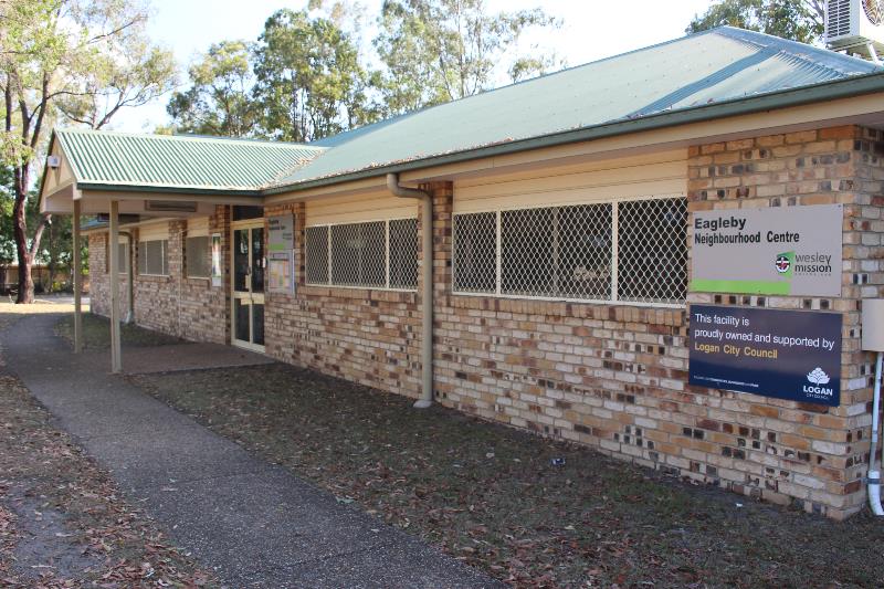 Exterior of Eagleby Neighbourhood Centre building with sign