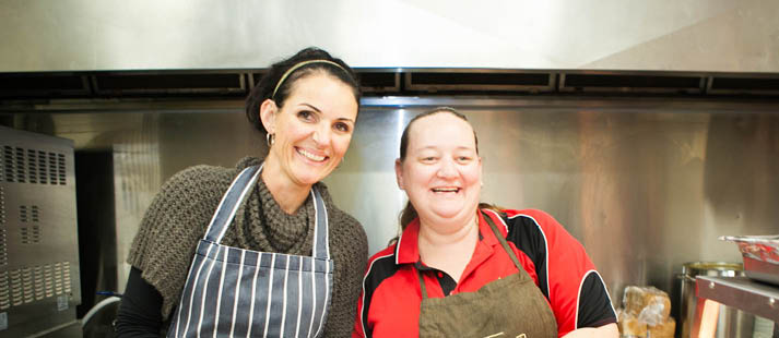 Two people in a kitchen