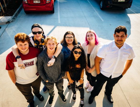 Group of young people smiling at camera