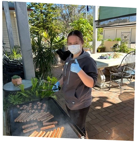 One of our wonderful care workers Toni cooking during the BBQ Week at Hyland House Respite Centre.