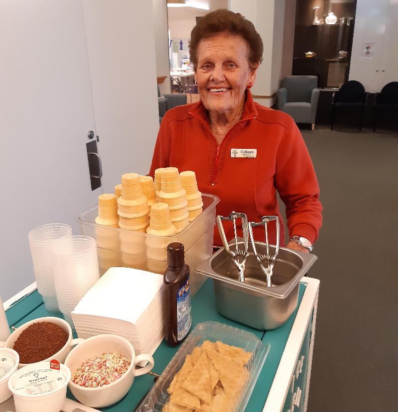 lady pushing ice cream trolley