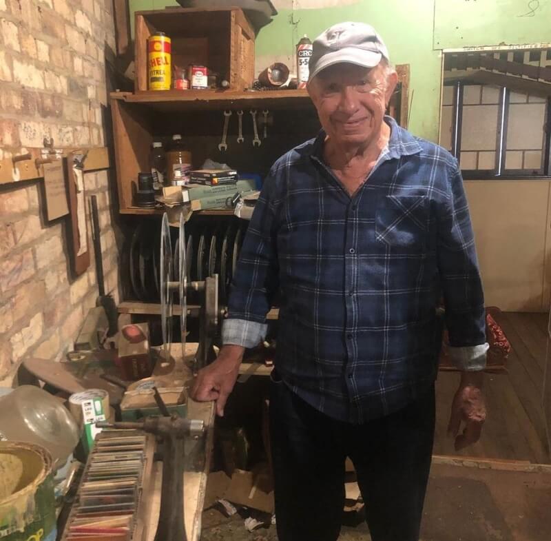 Older man standing in historic setting