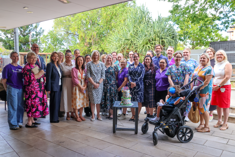 Group photo at the 10-year celebration of Hummingbird House