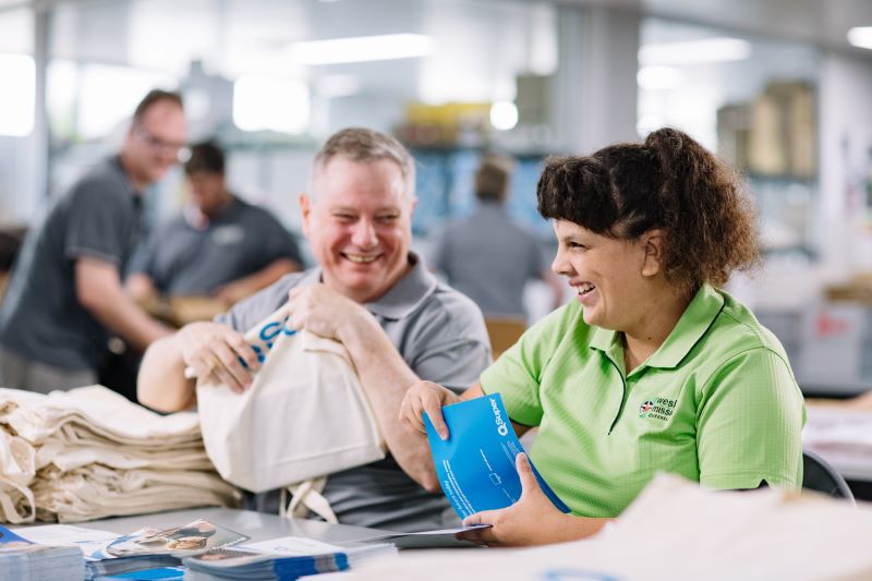 Workers smiling